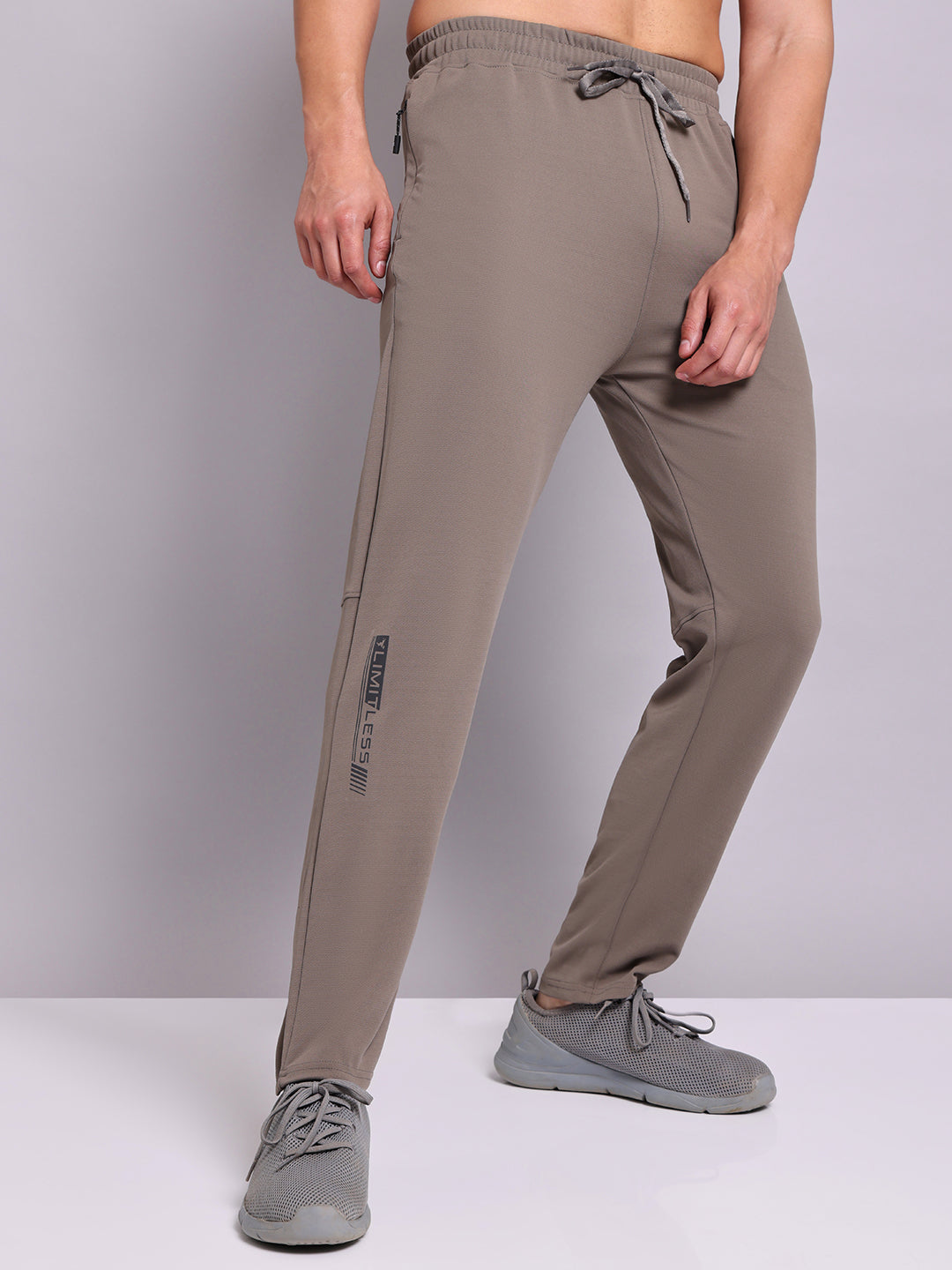 Men Solid Slim Fit Trackpants with ELASTO PLUS