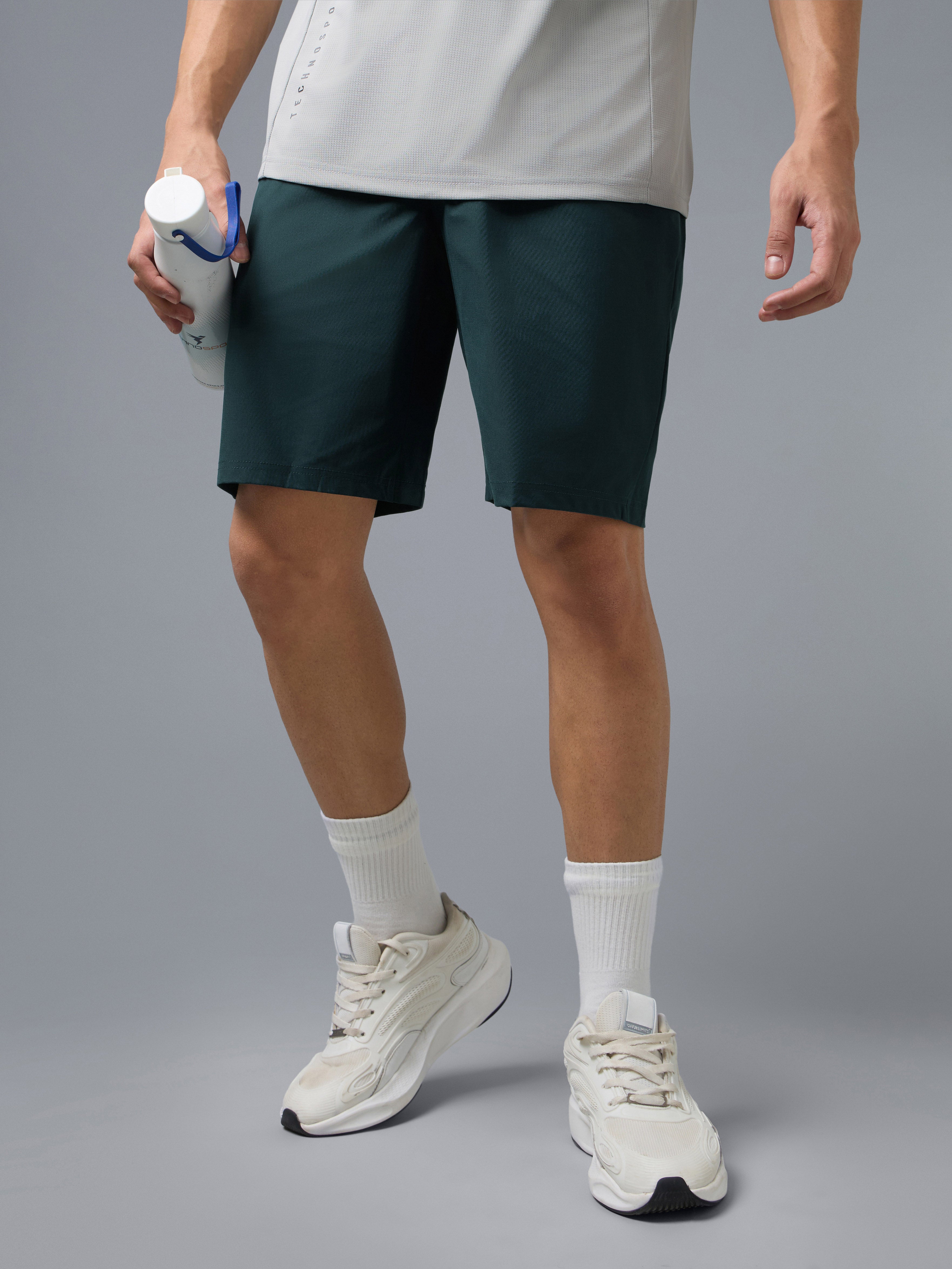 Men Solid Slim Fit Sports Shorts with DURACOOL