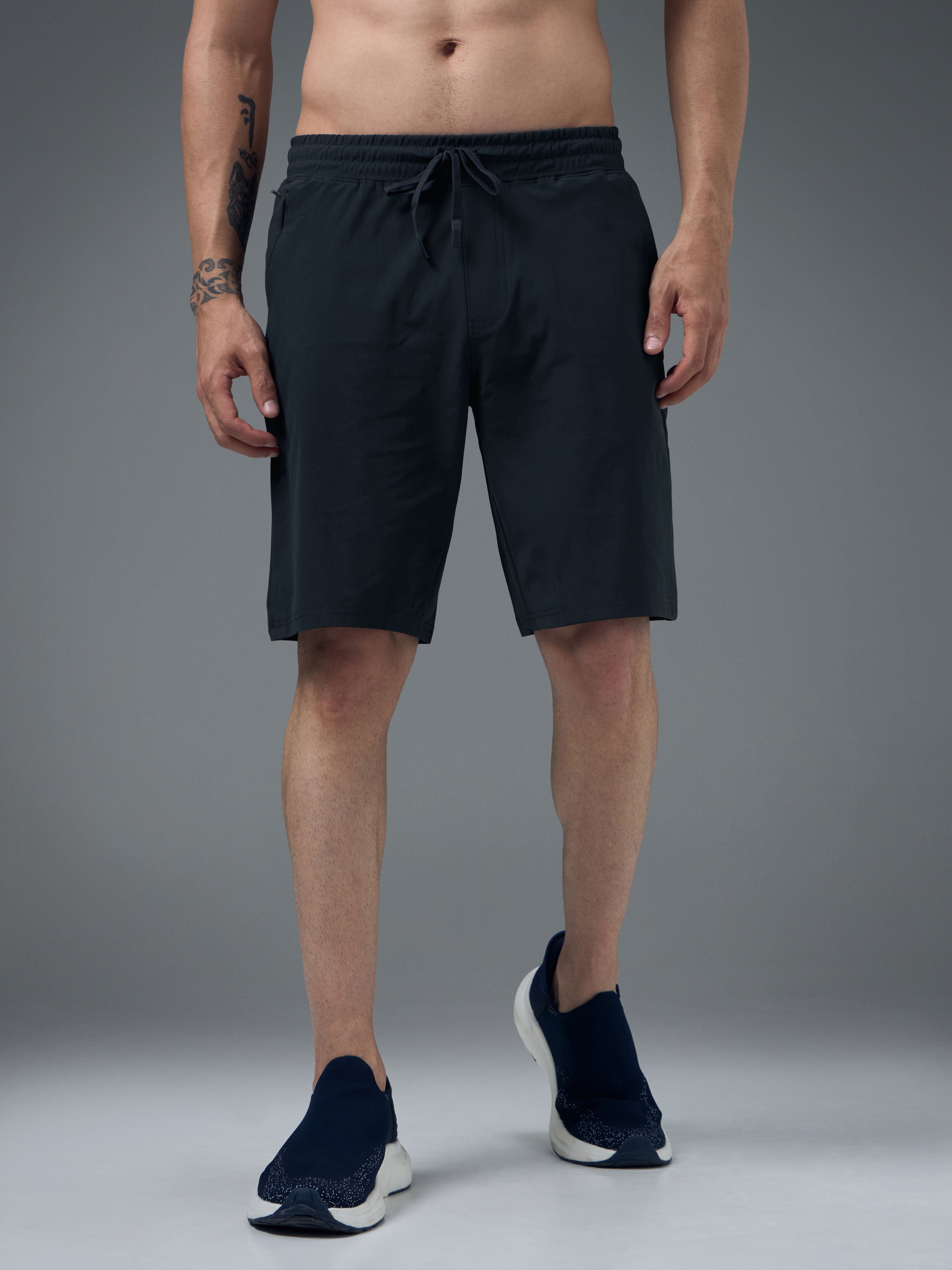 Men Solid Slim Fit Sports Shorts with DURACOOL
