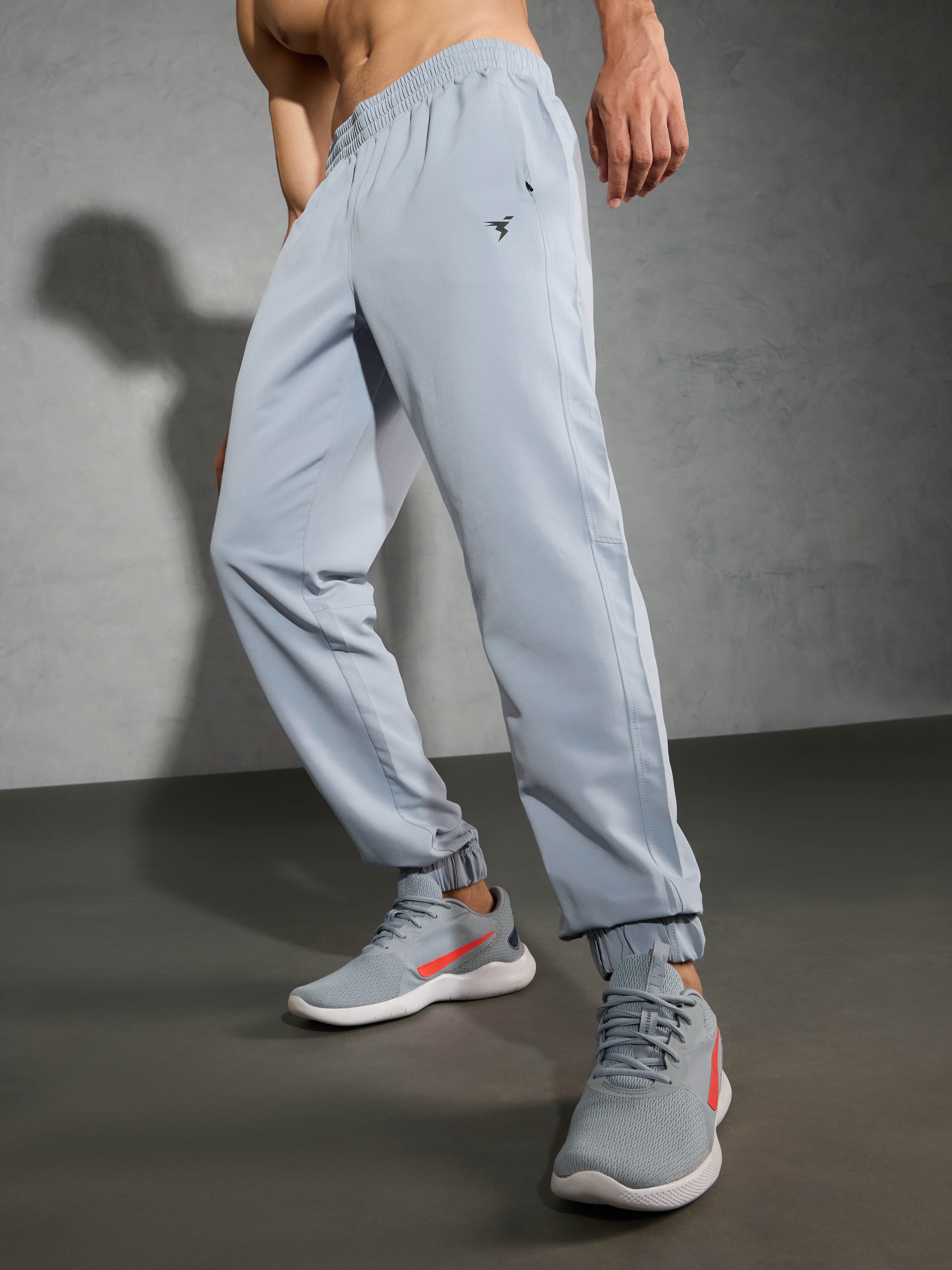 Men Solid Relax Fit Joggers with TECHNOLITE