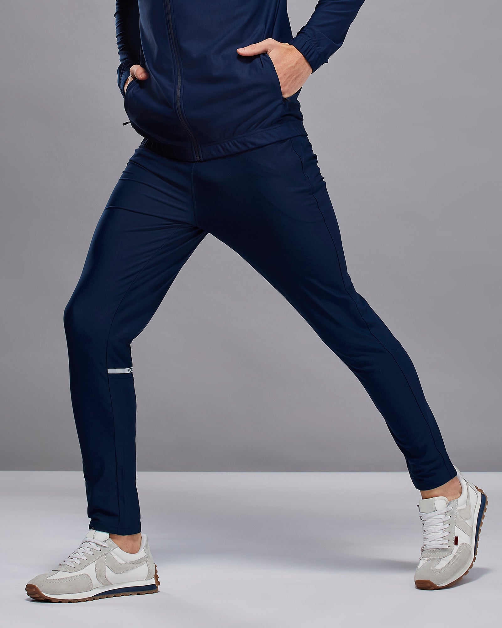 Men Solid Slim Fit Sports Trackpants with DURACOOL+