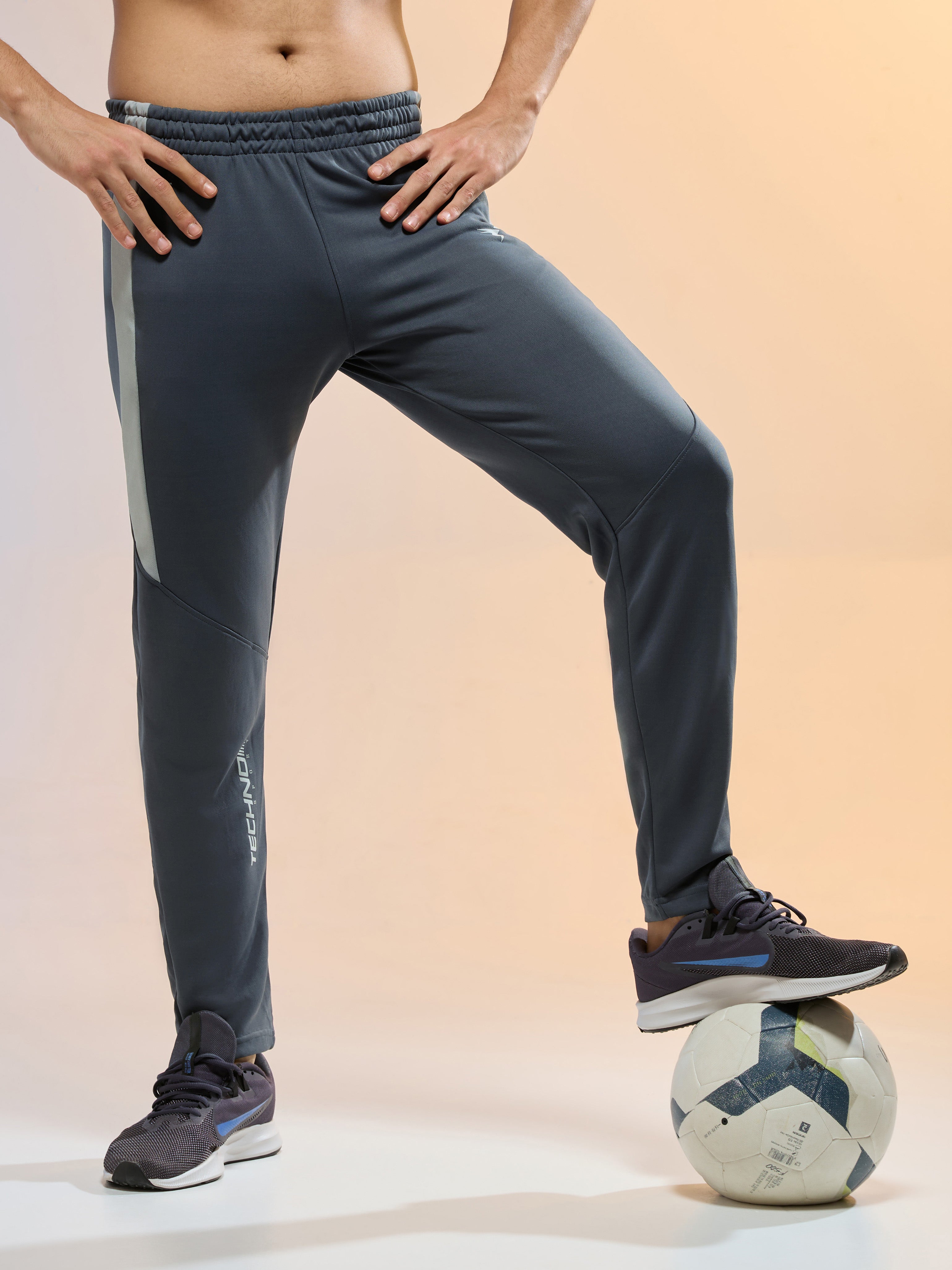 Men Solid Slim Fit Trackpants with TECHNO DRY