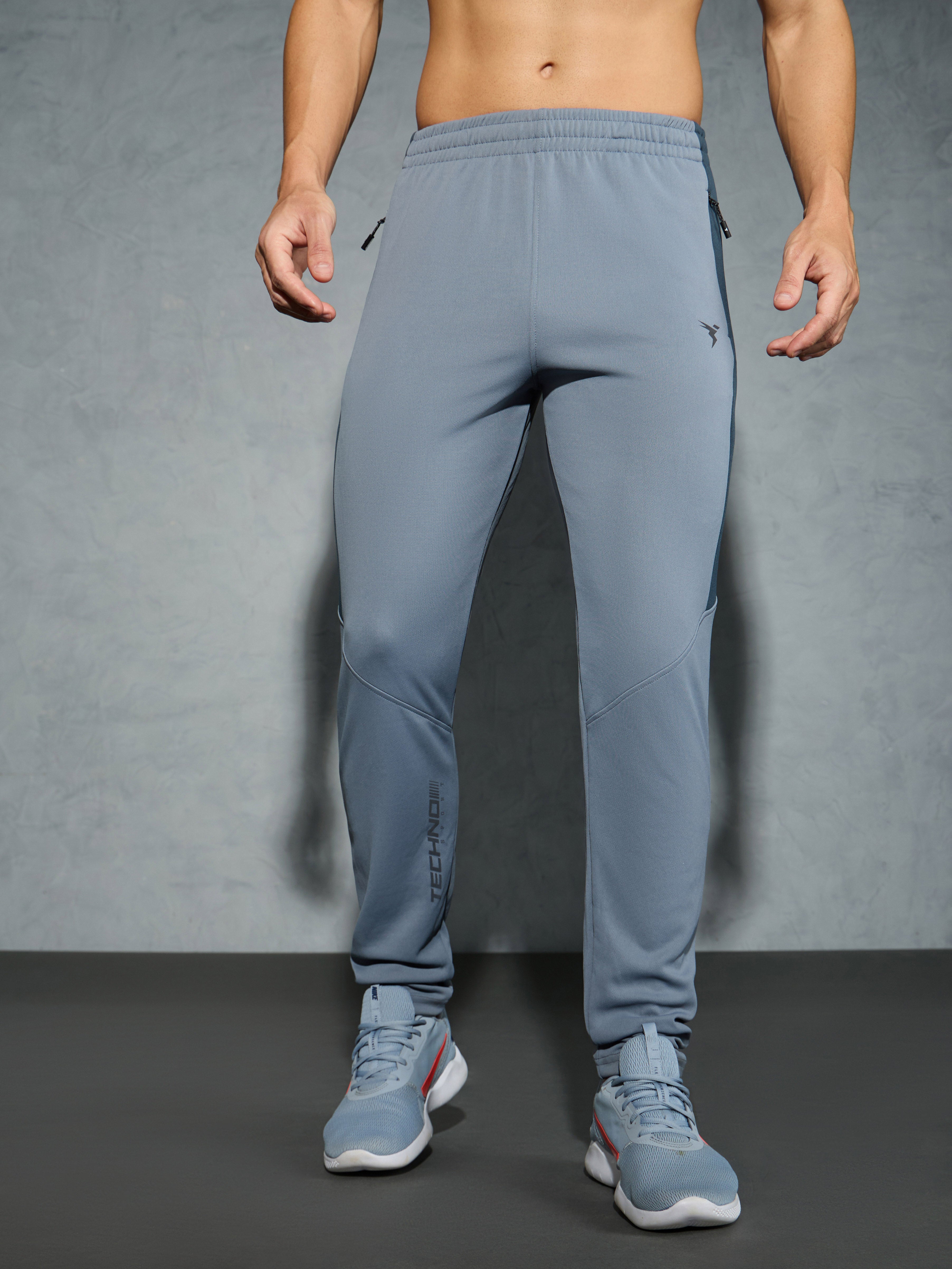 Men Solid Slim Fit Trackpants with TECHNO DRY