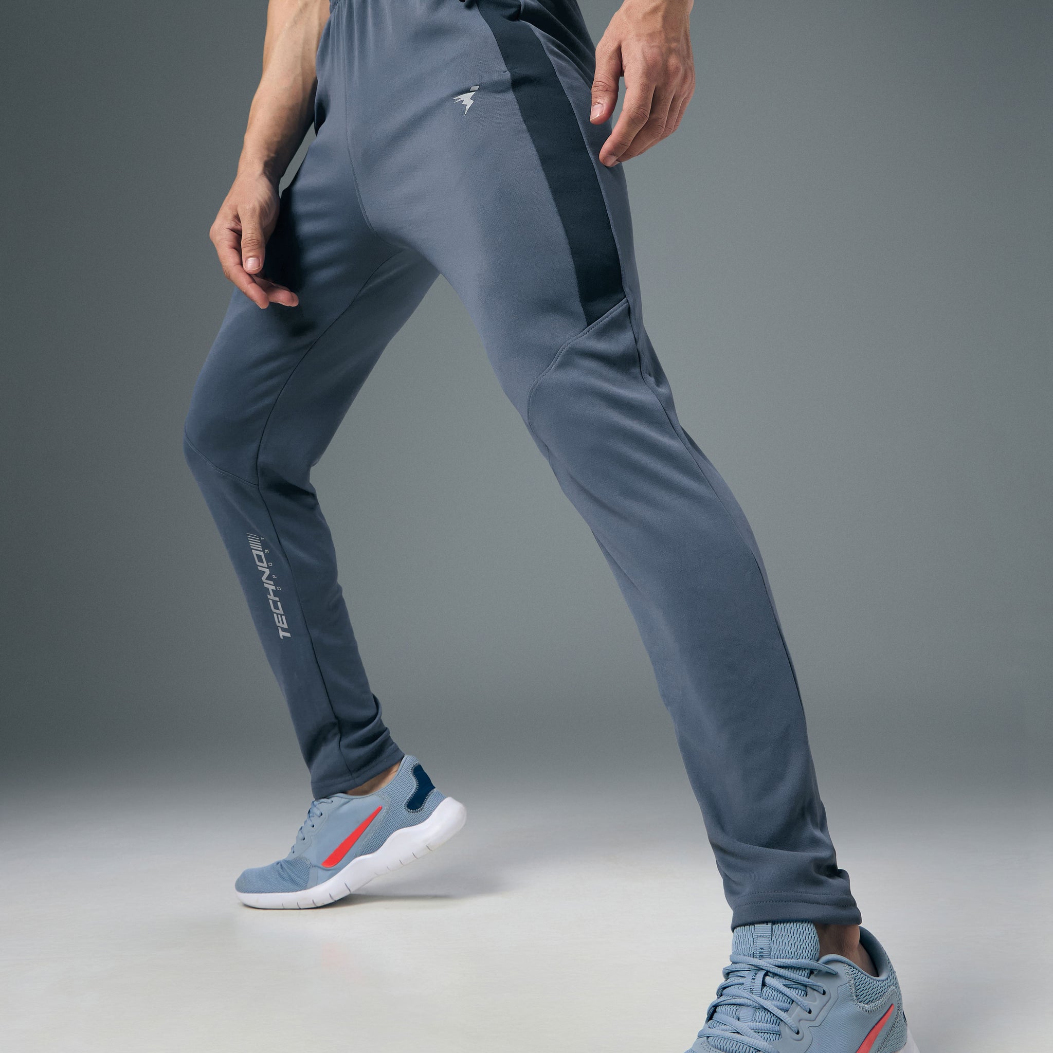 Men Solid Slim Fit Trackpants with TECHNO DRY