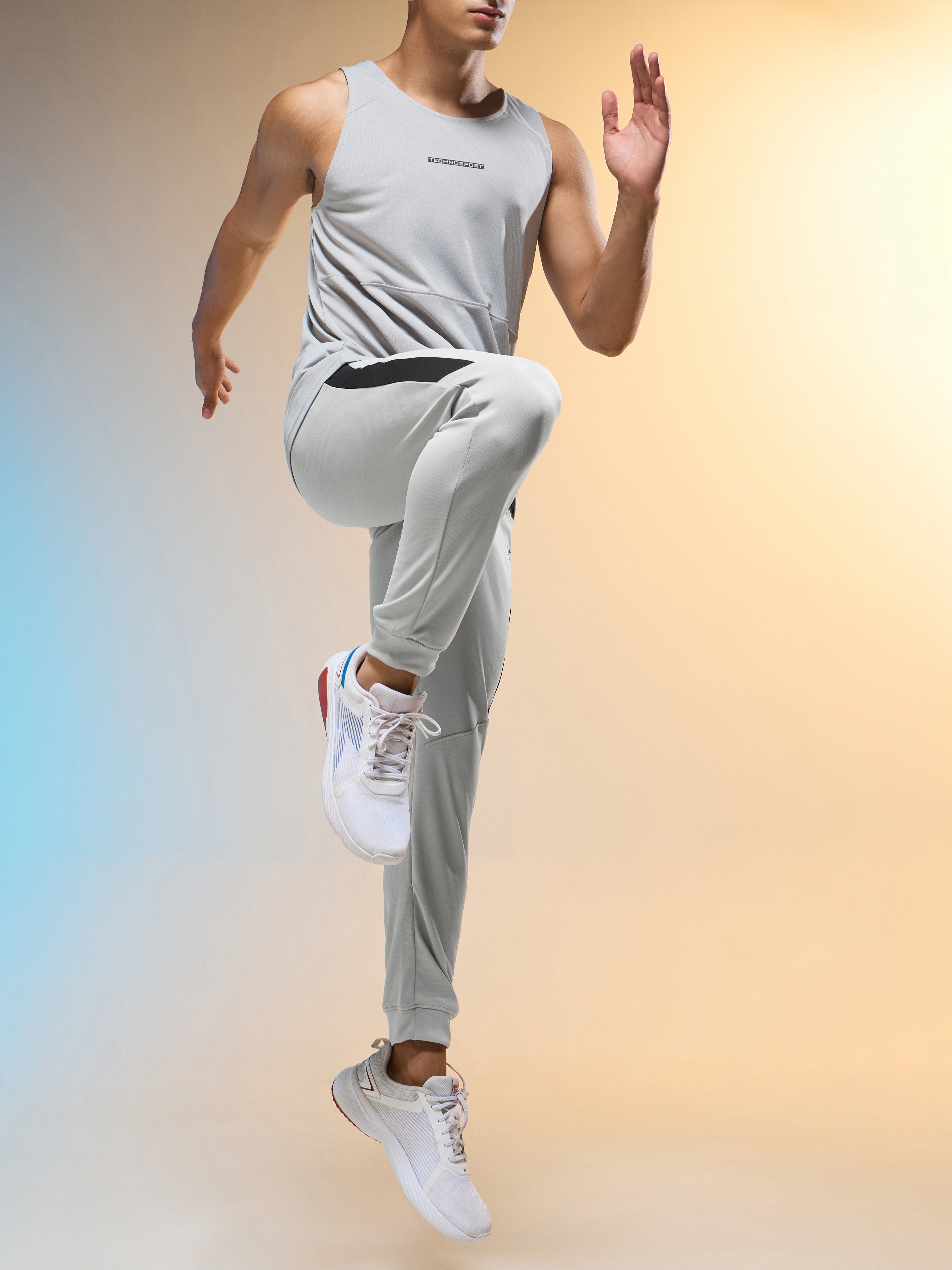 Men Melange Slim Fit Trackpants with TECHNO DRY
