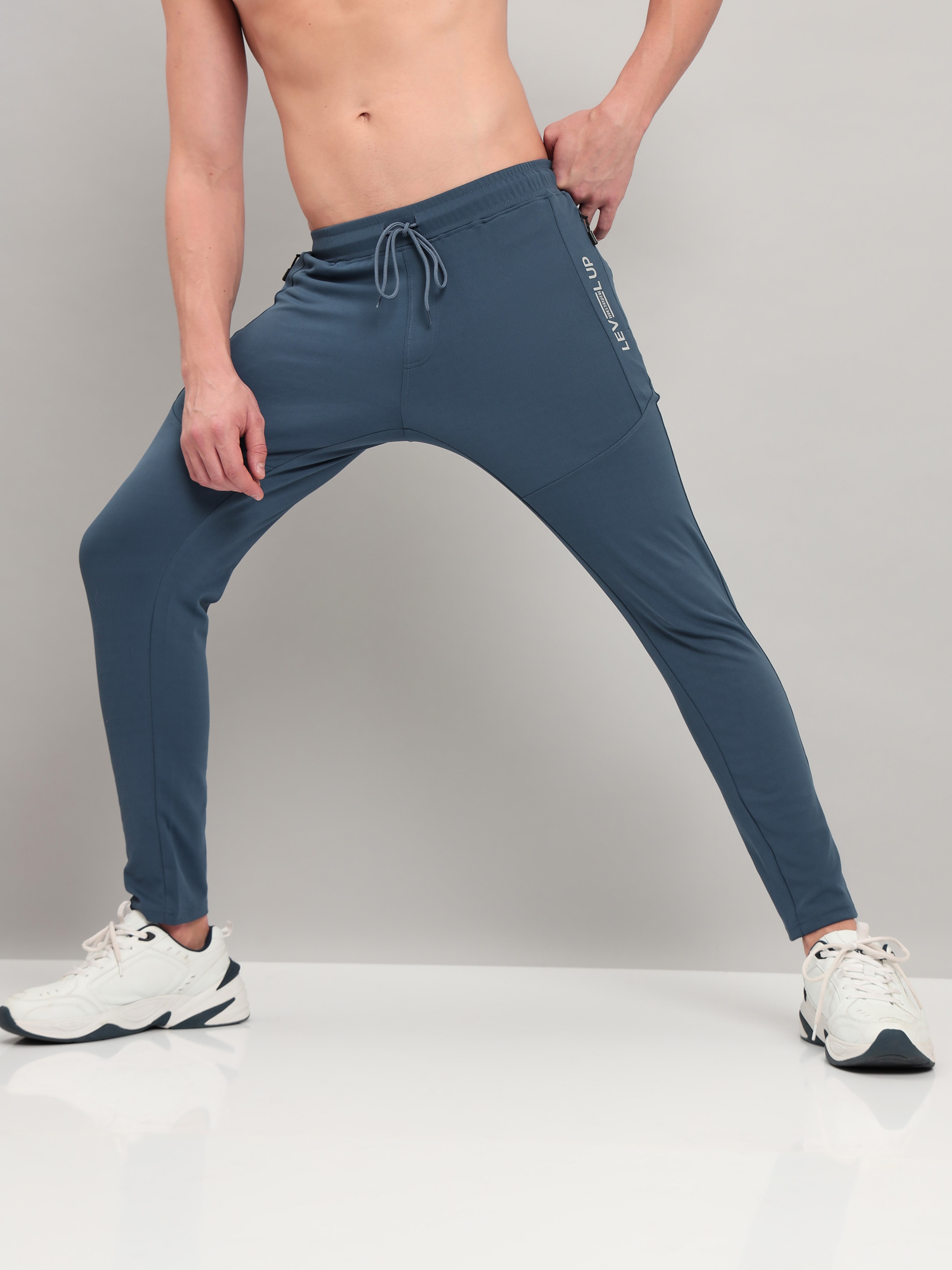 Men Solid Slim Fit Trackpants with TECHNO DRY