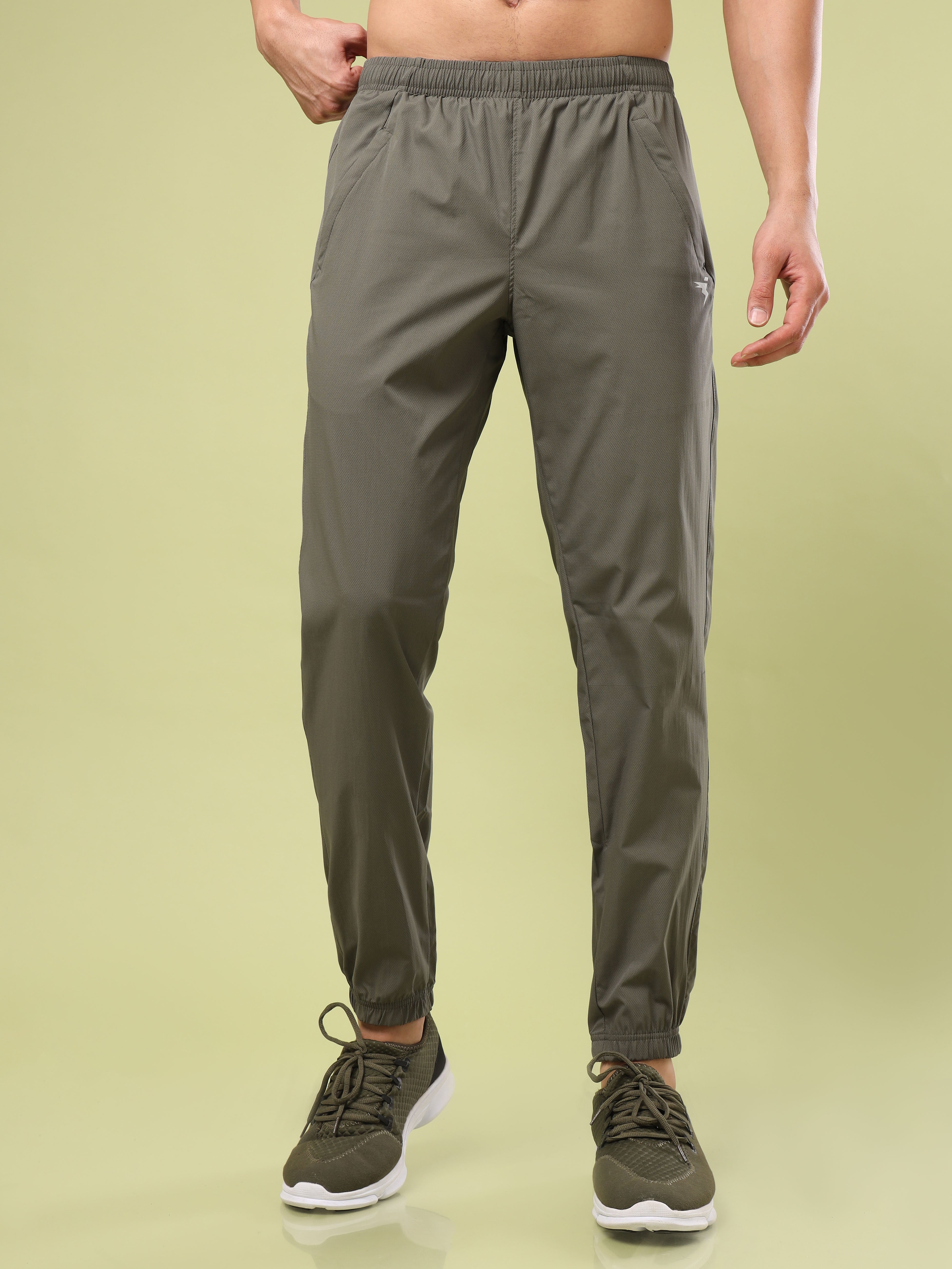 Men Solid Relax Fit Joggers with TECHNOLITE