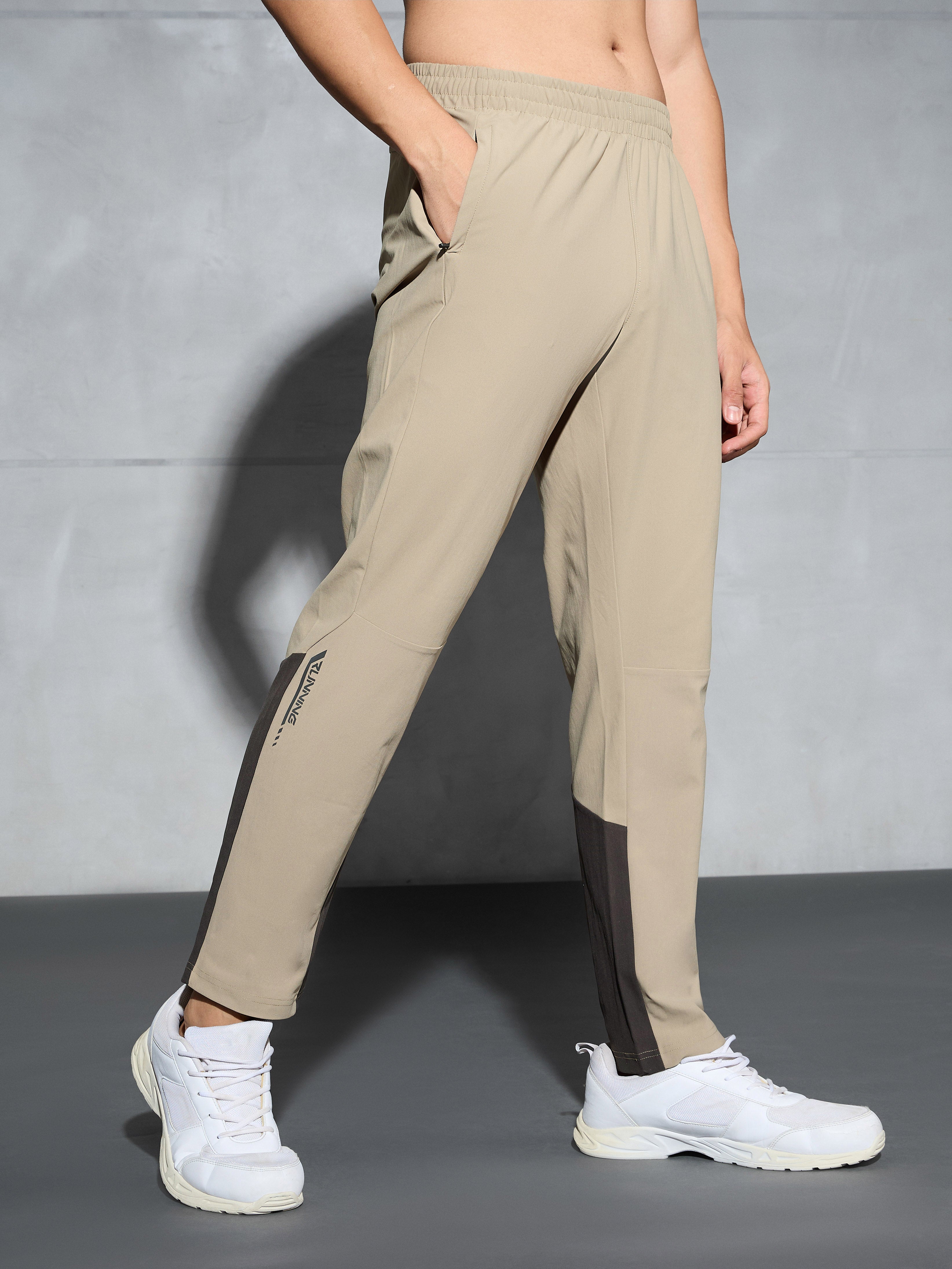 Men Solid Straight Fit Sports Trackpants with DURACOOL+