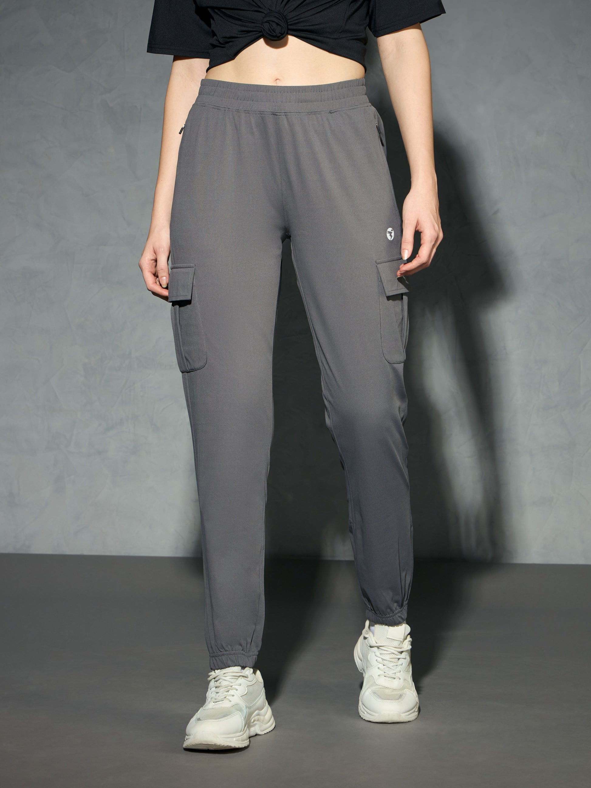 Women Solid Slim Fit Cargo Trackpants with TECHNO GUARD