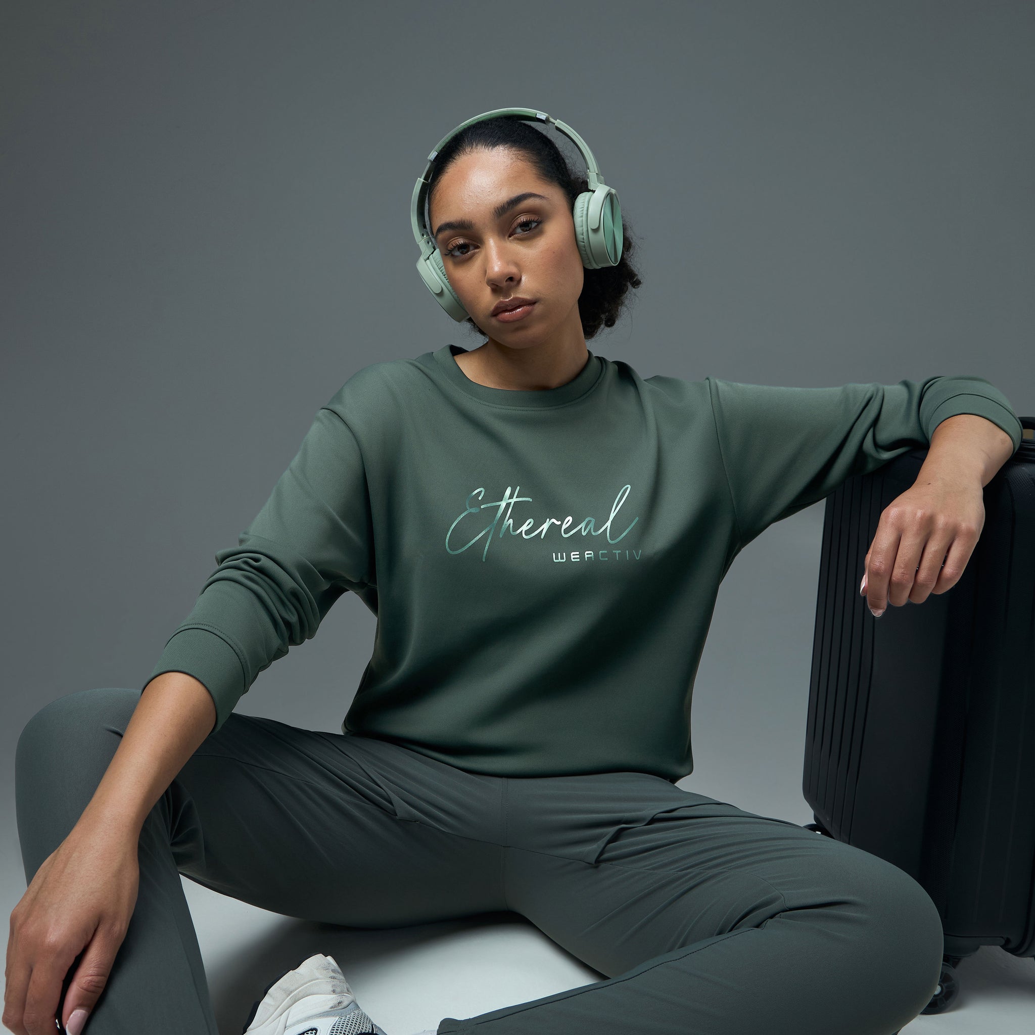 Women Solid Slim Fit Round Neck Sports Sweatshirt with ELASTOPLUS