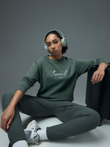 Women Solid Slim Fit Round Neck Sports Sweatshirt with ELASTOPLUS