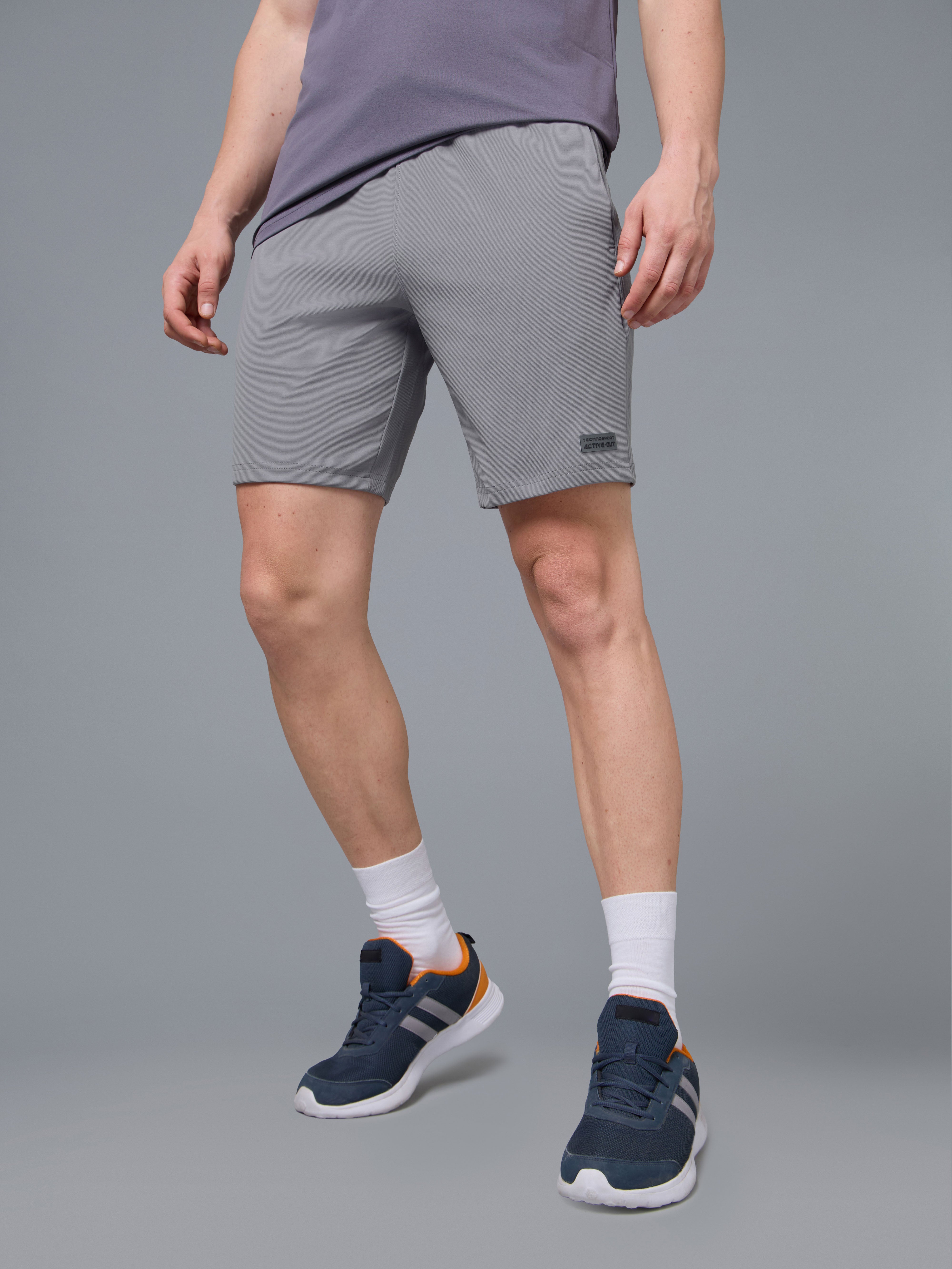 Men Solid Slim Fit Active Out Sports Shorts with ELASTOPLUS