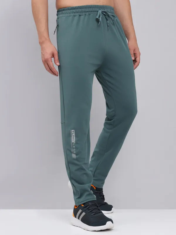 Men Solid Slim Fit Trackpants with ELASTO PLUS