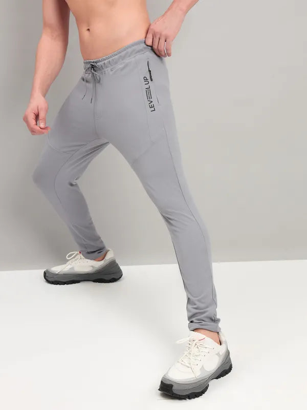 Men Solid Slim Fit Trackpants with TECHNO DRY